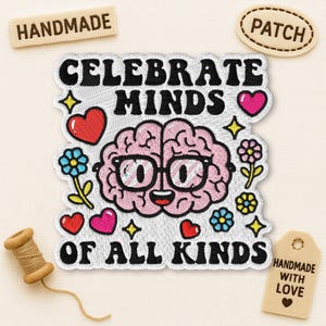 May include: Embroidered patch with the text "CELEBRATE MINDS OF ALL KINDS" featuring a pink brain wearing glasses, surrounded by hearts, flowers, and stars. Includes a "HANDMADE" wooden tag and a "PATCH" tag.