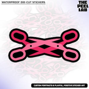 May include: A pink and black die-cut sticker featuring two crossed scissors. The scissors are in shades of pink with black outlines. The text "WATERPROOF DIE-CUT STICKERS" and "CUSTOM PORTRAITS & PLAYFUL, POSITIVE STICKER ART" are also visible.