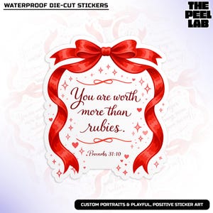 May include: A die-cut sticker with a red ribbon design and the text "You are worth more than rubies." The sticker includes hearts and stars, with the Bible verse Proverbs 31:10. The sticker is waterproof.