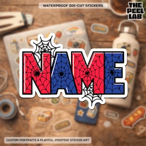May include: A die-cut sticker featuring the word NAME in bold block letters. The letters alternate between red and blue, each filled with a black spiderweb pattern. Additional black spiderweb illustrations are positioned at the top left and bottom right corners of the text, creating a cohesive graphic design.