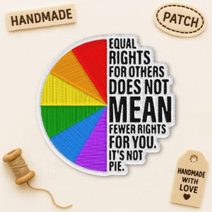 May include: Embroidered patch with a rainbow pie chart design and the text "EQUAL RIGHTS FOR OTHERS DOES NOT MEAN FEWER RIGHTS FOR YOU. IT'S NOT PIE." Includes "HANDMADE" and "PATCH" tags. A spool of thread is also visible.
