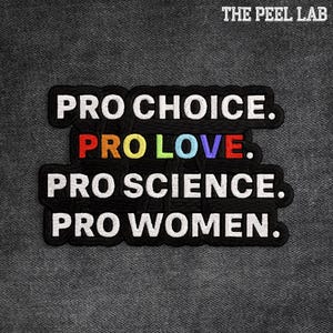 May include: Embroidered patch with the text "PRO CHOICE. PRO LOVE. PRO SCIENCE. PRO WOMEN." in white lettering on a black background. The word "LOVE" is in rainbow colors. The Peel Lab logo is at the top.