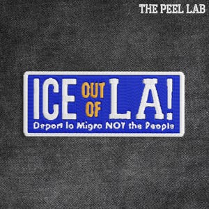 May include: Embroidered patch with a blue background and white border. The patch reads "ICE OUT OF LA!" in white, with "OUT OF" in orange. Below, it says "Deport lo Migro NOT the People" in white. The Peel Lab logo is at the top.