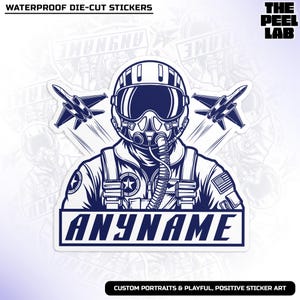 May include: A die-cut sticker featuring a detailed illustration of a pilot in a helmet and oxygen mask, with two fighter jets. The sticker has the text "ANYNAME" and "WATERPROOF DIE-CUT STICKERS". The Peel Lab logo is in the upper right corner.