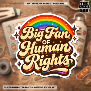 May include: A die-cut sticker with the text "Big Fan of Human Rights" in a retro font, arched by a rainbow. The sticker has a white border and star accents. The text "WATERPROOF DIE-CUT STICKERS" is at the top.