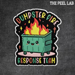 May include: Embroidered patch featuring a green dumpster with a cute face, flames, and the words "DUMPSTER FIRE RESPONSE TEAM." The patch has a black background with colorful text and a white border. The Peel Lab logo is at the top.