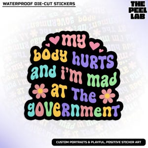 May include: Black die-cut sticker with the text "my body hurts and I'm mad at the government" in colorful, retro-style lettering. The sticker includes hearts and flower graphics. The Peel Lab logo is in the upper right corner.