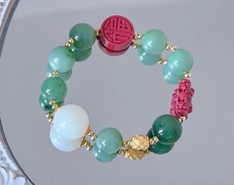 Pulsera vibrante de jade verde de grado AAA con cinabrio rojo: amuleto de prosperidad y protección