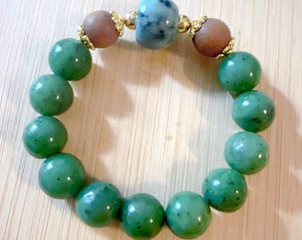 Grünes Nephrit Armband mit Lila Jadeit Akzent Perle