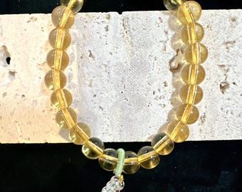 Pulsera elegante con dije de piedra