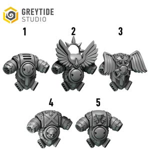 May include: Five gray miniature figurines of armored torsos, each with unique designs. The figurines have circular and rectangular shapes, with details like wings, skulls, and decorative elements. The logo "GREYTIDE STUDIO" is in the top left corner.