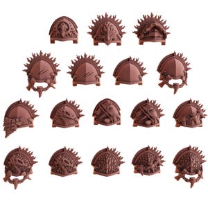 May include: Set of 16 miniature plastic shoulder pads for tabletop gaming. The shoulder pads are brown and feature various designs, including a dragon, a skull, and a sunburst.