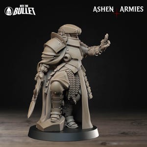 May include: A detailed, gray miniature figure of a warrior in full armor, holding a sword and gesturing with their other hand. The figure has a helmet, shoulder pads, and chainmail. The base is black, and the figure is labeled "Ashen Armies" and "Bite the Bullet".