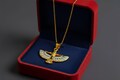 Opal Unique Gold Winged Goddess Isis Dainty Pendant Necklace, Egyptian Jewelry, Divine Pendant, Gift for Men and Women product logo