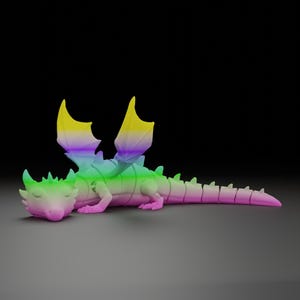 May include: A colorful dragon figurine in a gradient of rainbow hues, including yellow, green, and pink. The dragon is lying down with its wings spread, showcasing a detailed design. The figurine is a fantasy-themed collectible.