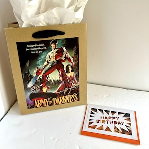 Sacola de presente e cartão comemorativo da história em quadrinhos Army of Darkness