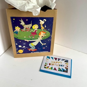 Sacola de presente e cartão comemorativo dos quadrinhos dos Jetsons