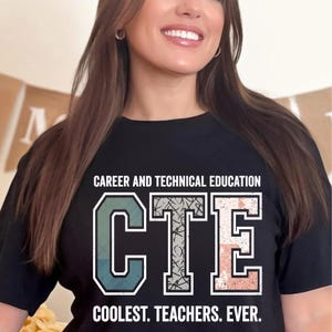 May include: Black t-shirt with the text "CAREER AND TECHNICAL EDUCATION" above the letters "CTE" in teal, gray, and pink. Below the letters is the text "COOLEST. TEACHERS. EVER."