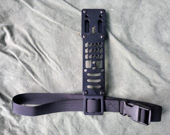Black MHA modular holster adapter compatible with Safariland QLS quick locking system