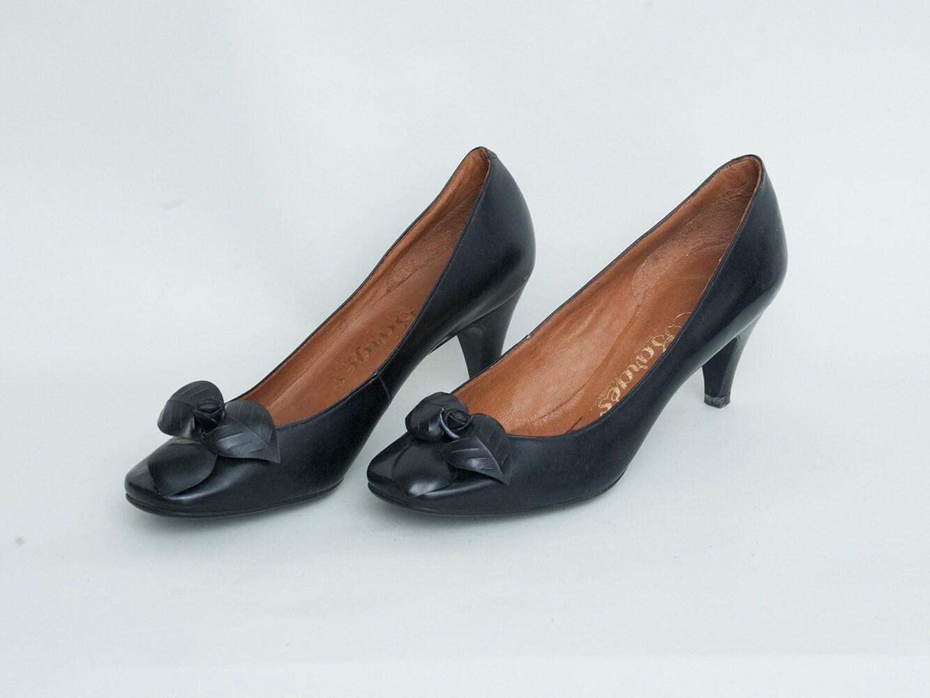 narrow black pumps