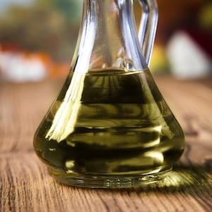 2 oz 100% Pure Organic Tamanu Oil in a Plastic Bottle - Unrefined and Cold Pressed