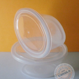 25 - 2 oz Clear Oval Plastic Souffle / Portion Cups and Lids