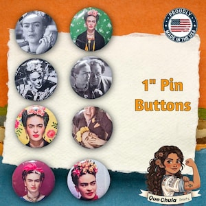 May include: A collection of seven 1-inch round pin buttons featuring portraits of Frida Kahlo in various poses and styles. Some buttons are in black and white, while others are in color. The text "1" Pin Buttons" is displayed in orange.