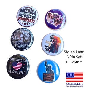 May include: A set of six round pins, each 1 inch (2.5 cm) in diameter, with various designs and text. The pins feature phrases like "America Was Built By Immigrants" and "Immigrants Make America Great."