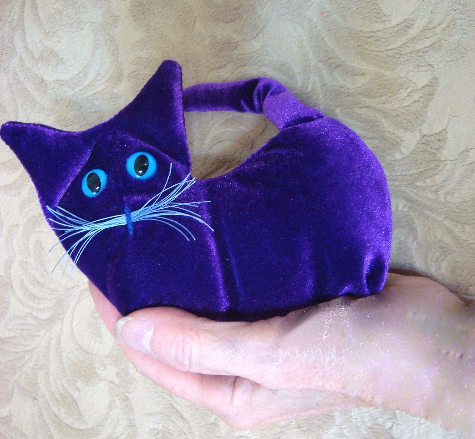 purple stuffed cat