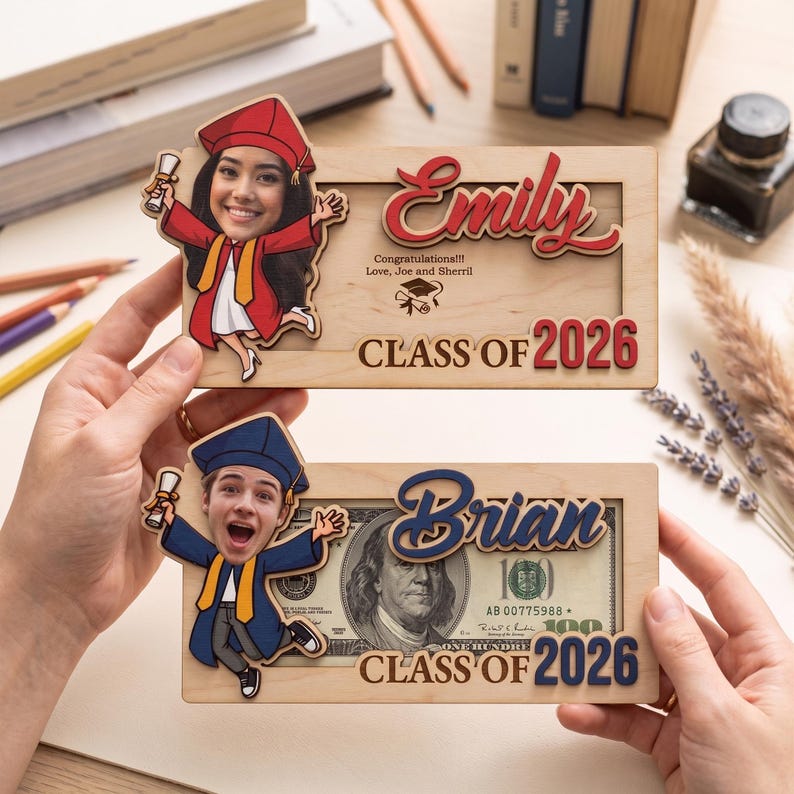 May include: Two wooden graduation frames, one with "Emily" in red script and "Class of 2026", the other with "Brian" in blue script and "Class of 2026". Each frame has a cartoon cutout of a graduate.