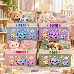 May include: Four rectangular fabric storage bins with rope handles, each personalized with a name: Noah, Oliva, Sophia, and Leo. The bins feature colorful cartoon graphics of smiling dumplings, stars, clouds, and hearts, and contain plush toys and books.