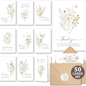 May include: A set of white greeting cards with floral illustrations and various messages, including "Thank you" and "Gratitude." The cards are accompanied by brown envelopes and a sticker, with a label indicating a 50-card set.