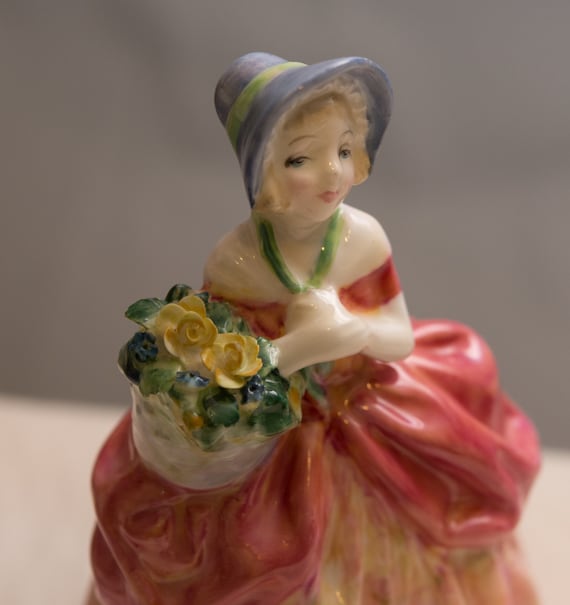 Royal Doulton Figurine Cissie HN1809 L.Harridine 1937-1993 Pink Dress yellow Flower basket