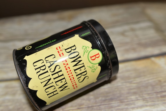 Bowers Cashew Crunch 1950s Advertising Tin with Pennsylvania Dutch Tole Painting Black