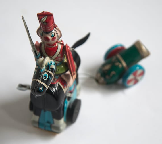 TPS Japan Tin Toy Soldier Complete with Cannon riding Pony Wind up toy works Complete working Key wound lithograph toy