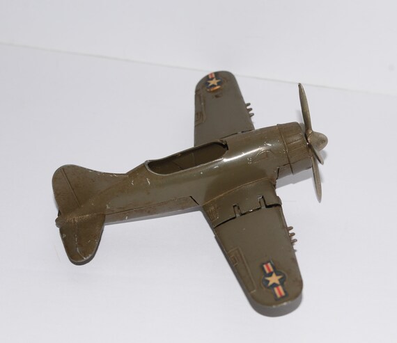 Hubley Folding Wing Kiddie Toys Die cast Plane Circa 1960s Army Green with decals F4U Corsair cica 1960s