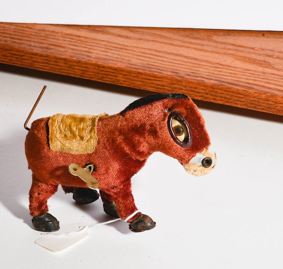 Vintage Wind Up toy Sad Donkey Made in Japan works but needs TLC 1940s Plush over Metal Clock Work Toy with Key