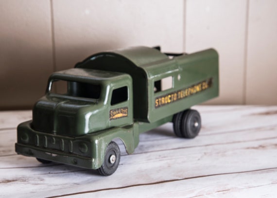 Structo Telephone Truck with Great graphics army Green Cast Metal toy 1950s Shelf Sitter or collector Die Cast Toys Reduced