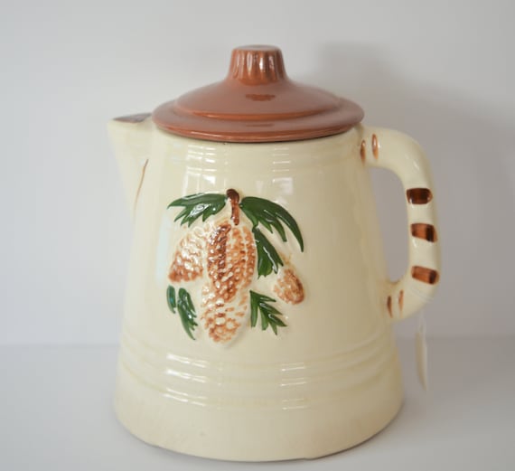 McCoy or American Bisque Pine Cone USA Kettle Cookie Jar 1950s Original Country Kettle cookie Jar with Pine Cone Motif and striped handle
