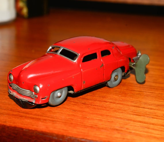 Occupied Japan Metal Wind up Magic Car Works 1940-50 Tin Car clock works Red Car