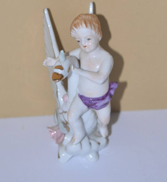 Ucago Cach Pot Bud Vase Angel Swan Seraphim cherub figurine with swan porcelain