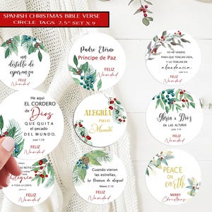 May include: Set of nine 2.5-inch circle tags with Spanish Christmas Bible verses. Each tag features festive watercolor greenery and text in various fonts. The tags are designed for holiday gift-giving and crafting.