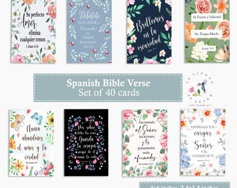 May include: A set of 40 Spanish Bible verse cards. Each card features floral borders and inspirational quotes. The cards are rectangular, with dimensions of 4x6 inches and 2.5x3.5 inches. The text includes phrases like "Su perfecto Amor" and "Nunca abandones el amor y la verdad."
