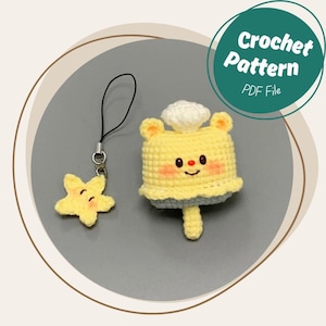 May include: A yellow crochet bear-shaped charm with a smiling face and a white cloud on top. A yellow star charm is attached to a black string. The image includes text that says "Crochet Pattern PDF File."