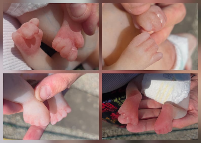 May include: A silicone reborn baby doll featuring realistic skin tones with pinkish undertones, detailed tiny fingers, and small toes. The doll is shown in four separate close-up views highlighting the hands and feet, with a white diaper visible.