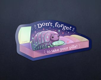 May include: A sticker featuring a cartoon pill bug in a pill box with the text "Don't forget to take your pills!". The pill bug is purple with iridescent accents. The pill box is pink and the background is dark blue.