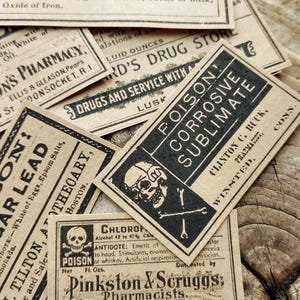 A scene showing antique reproduction label stickers from the Poison Bottle Labels sticker pack. The stickers are printed with blank ink on light brown kraft paper and are rectangular. Labels for formaldehyde, arsenic, sugar lead, strychnine, carbolic acid, corrosive sublimate and chloroform liniment are shown lying on a rustic wood surface.