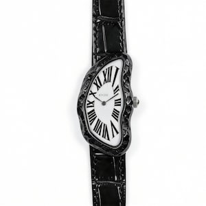 May include: A unique wristwatch with a black leather band and a distorted, irregular-shaped black watch face. The white watch face features black Roman numerals and the brand name "KYOSI". The watch has a small silver crown.