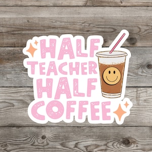 May include: Pink and white sticker with the text "HALF TEACHER HALF COFFEE" and a cartoon image of a coffee cup with a smiley face.
