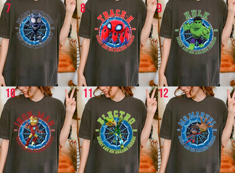 Puede incluir: Camisetas de color gris oscuro con dise&ntilde;os de superh&eacute;roes. Cada camiseta tiene un gr&aacute;fico circular con un personaje de superh&eacute;roe, una telara&ntilde;a y texto. Los personajes incluyen Black Panther, Spider-Man, Hulk, Iron Man, Electro y Ms. Marvel.